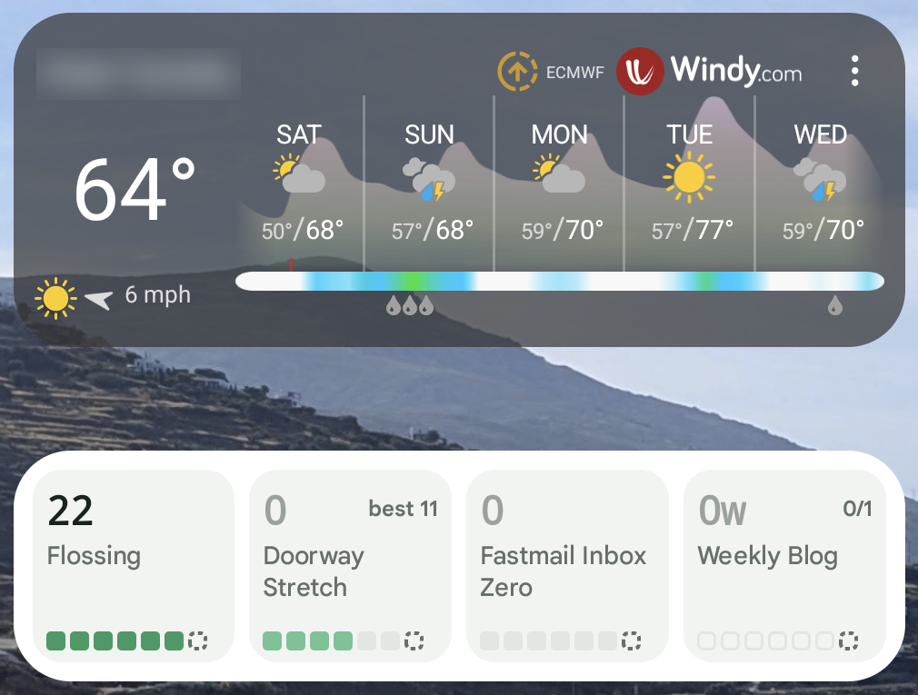 Android home screen with a weather widget above the Streaks widget, which shows four habits: Flossing, Doorway Stretch, Fastmail Inbox Zero, and Weekly Blog